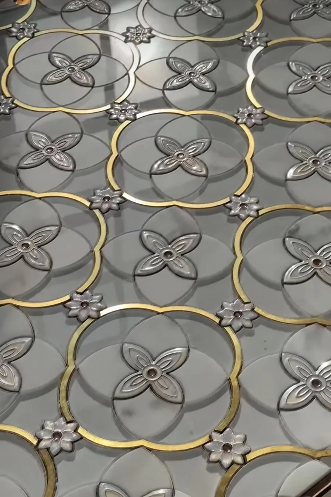 Brass-lined flower floor