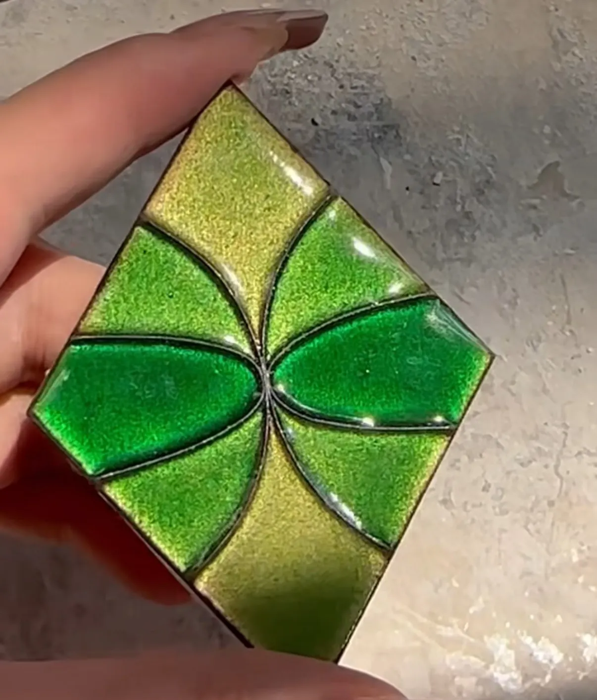 One enamel piece, close up