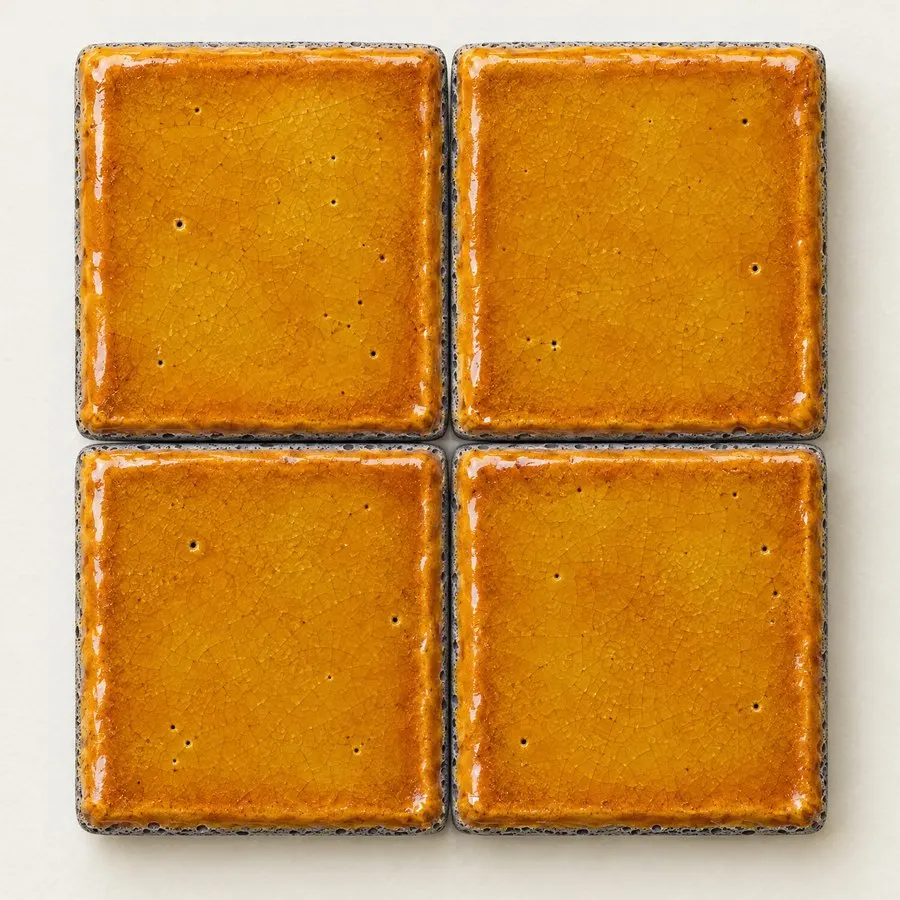 Saffron glazed lava stone tile