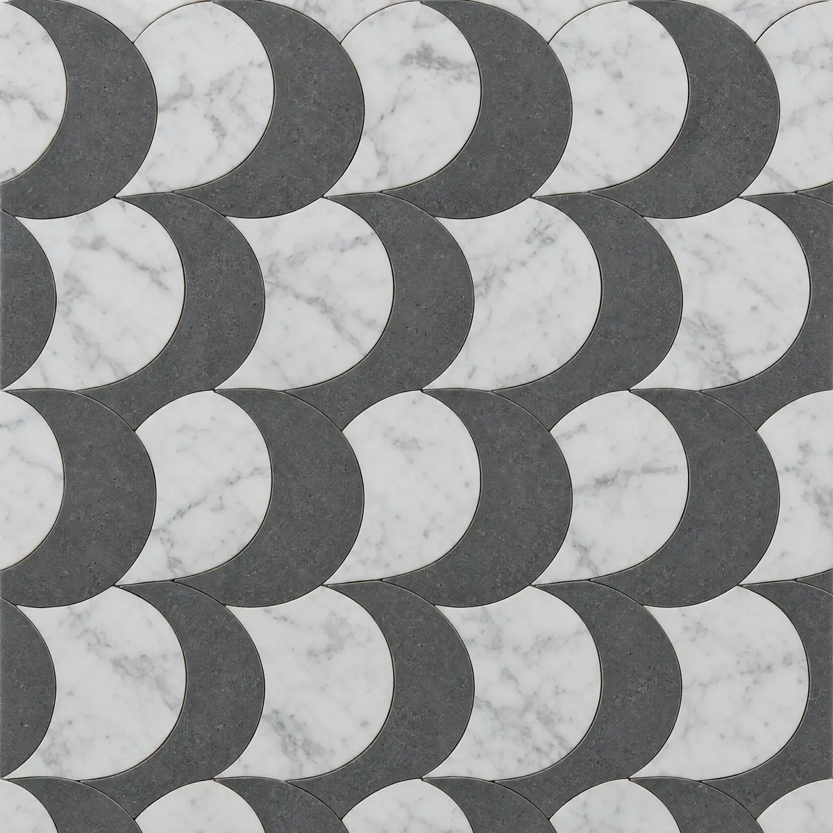 Crescent waterjet design in Grey Basalt and Carrara